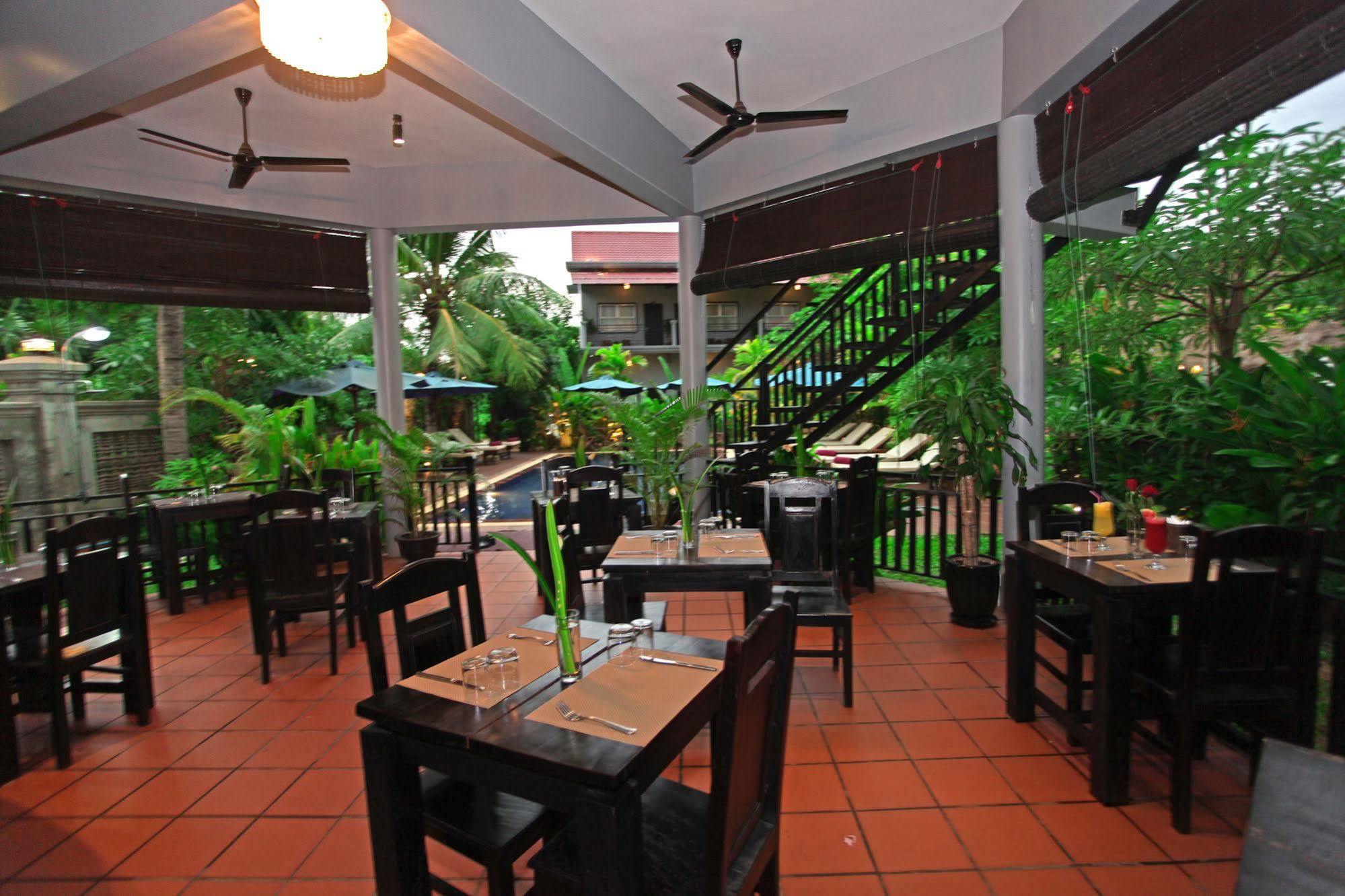 Reveal Angkor Hotel Siem Reap Bagian luar foto